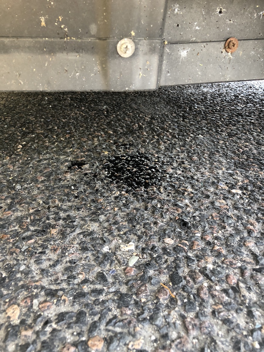 A puddle below my engine